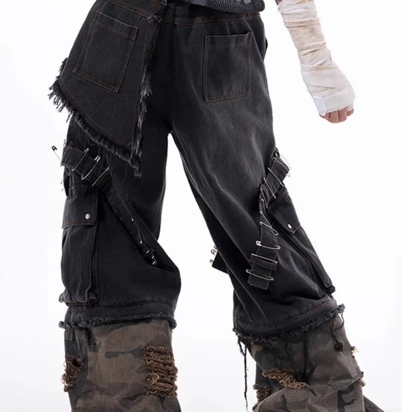 Men's grey cotton jeans with a camouflage splicing pattern, pin accents, and ribbon trim details.