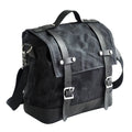 Black waterproof canvas motorcycle side pannier bag with cowhide accents showing mounting straps