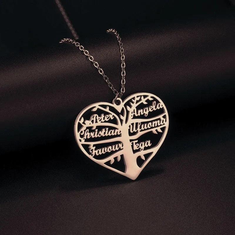 Custom silver necklace with hollow heart and life tree pendant engraved with names on a 50cm chain.