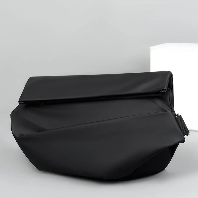 Men's grey crossbody bag showing internal phone pocket and document compartment with shoulder strap