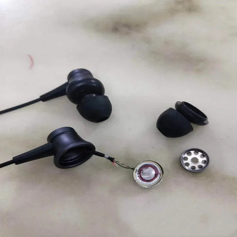 Black, blue and red piston in-ear headphones with 3.5mm wired connection