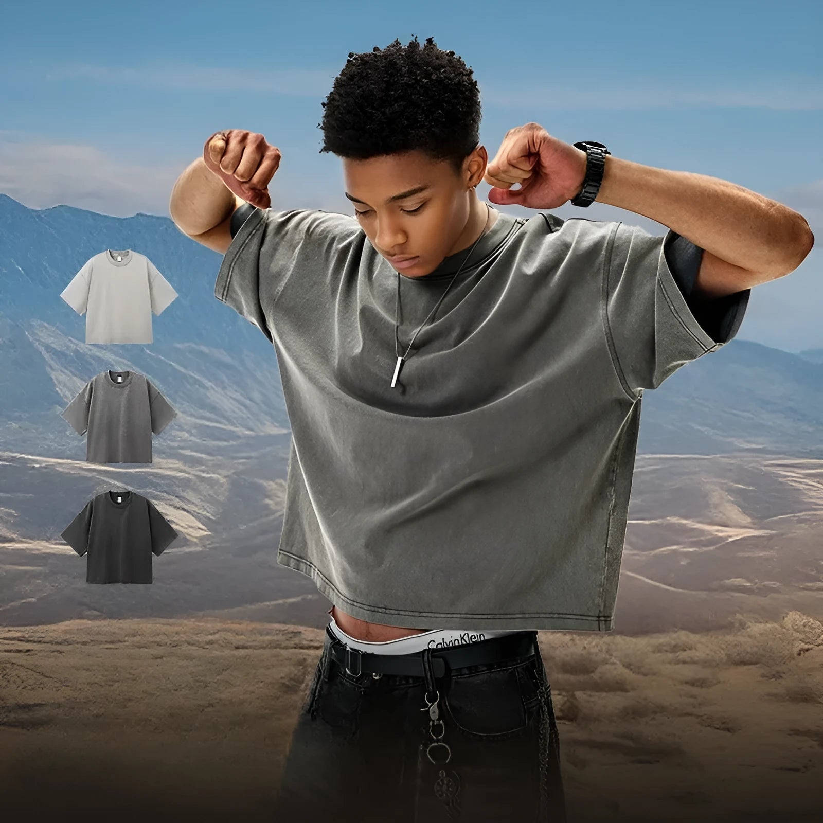 Man wearing a vintage washed khaki cotton t-shirt with loose fit and drop-shoulder sleeves.