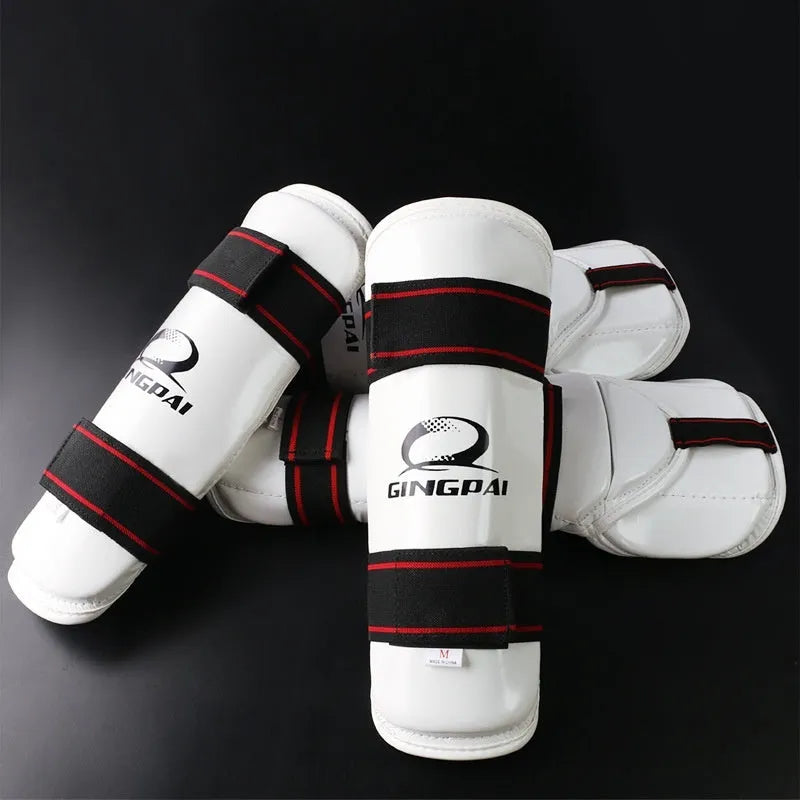 Taekwondo protective gear set showing arm guards, elbow protectors, and leg guards in PU EVA foam material