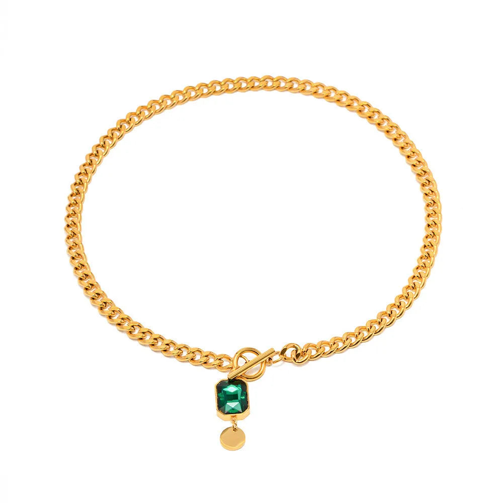 Gold geometric pendant necklace with emerald green zircon on titanium steel Cuban chain