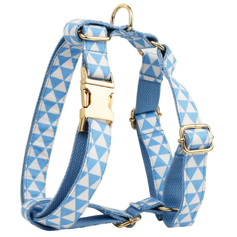 Blue cloth dog accessory set showing vest, collar, leash, and bow for small to medium breeds