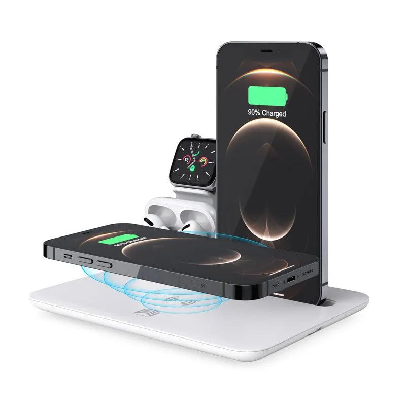 Black and white wireless charging station for phone, smartwatch, and headphones on a desk.