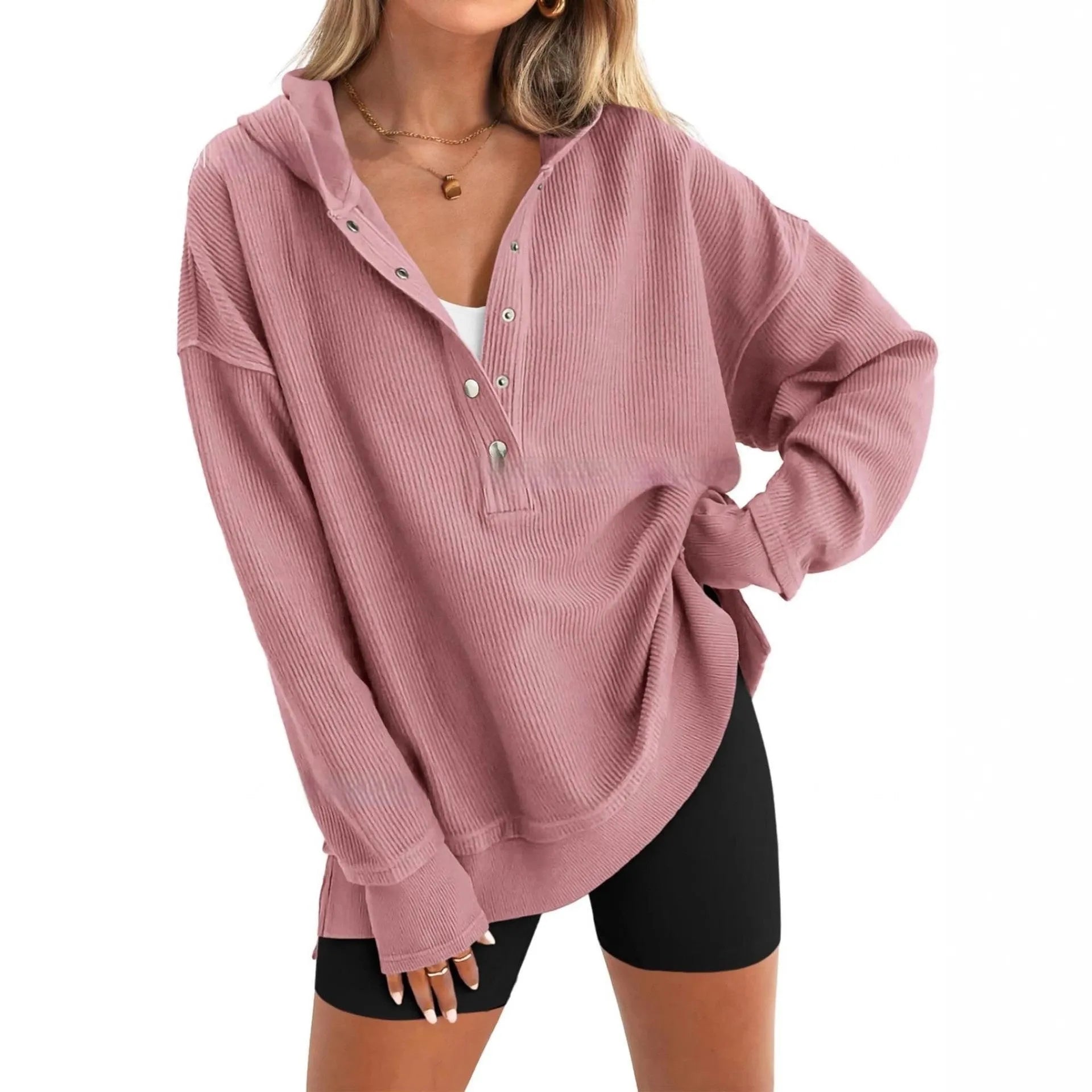 Women's loose fit peacock green raglan sleeve pullover sweater on a hanger.