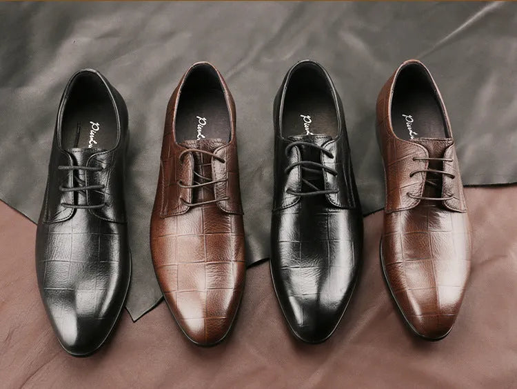 Men's black leather derby shoes with pointed toe and checkered pattern on a white background.