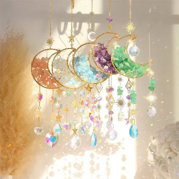 K9 crystal moon pendant on a metal chain for car interior decoration.