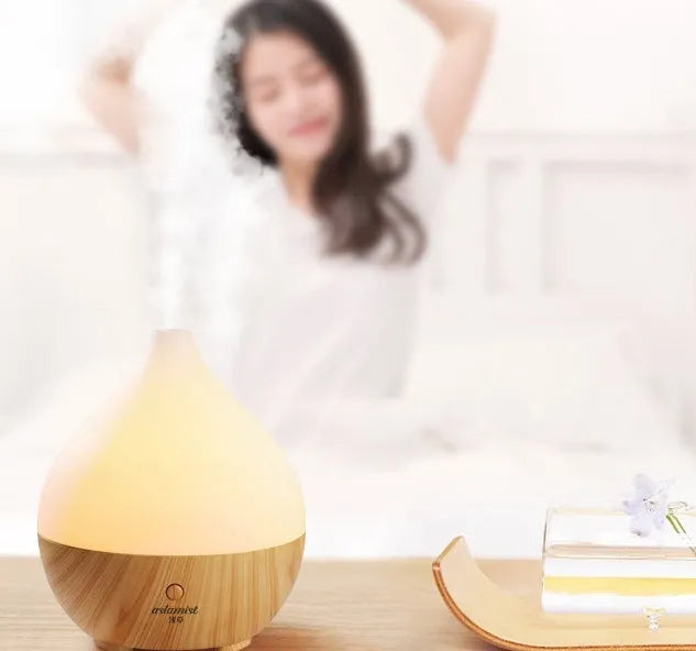 Asakusa wood grain finish vase-shaped ultrasonic aroma diffuser with 100ml water tank capacity.