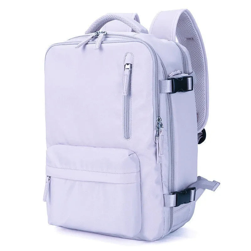 Large black waterproof nylon mummy backpack with zipped compartments.