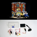 Plastic LED lighting kit components for a MOC model corner repair shop diorama.