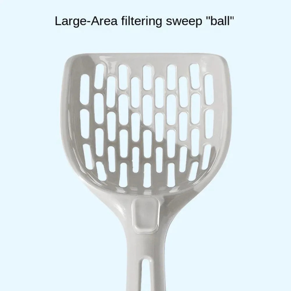 Grey plastic cat litter scoop with handle sitting upright in its integrated square base.