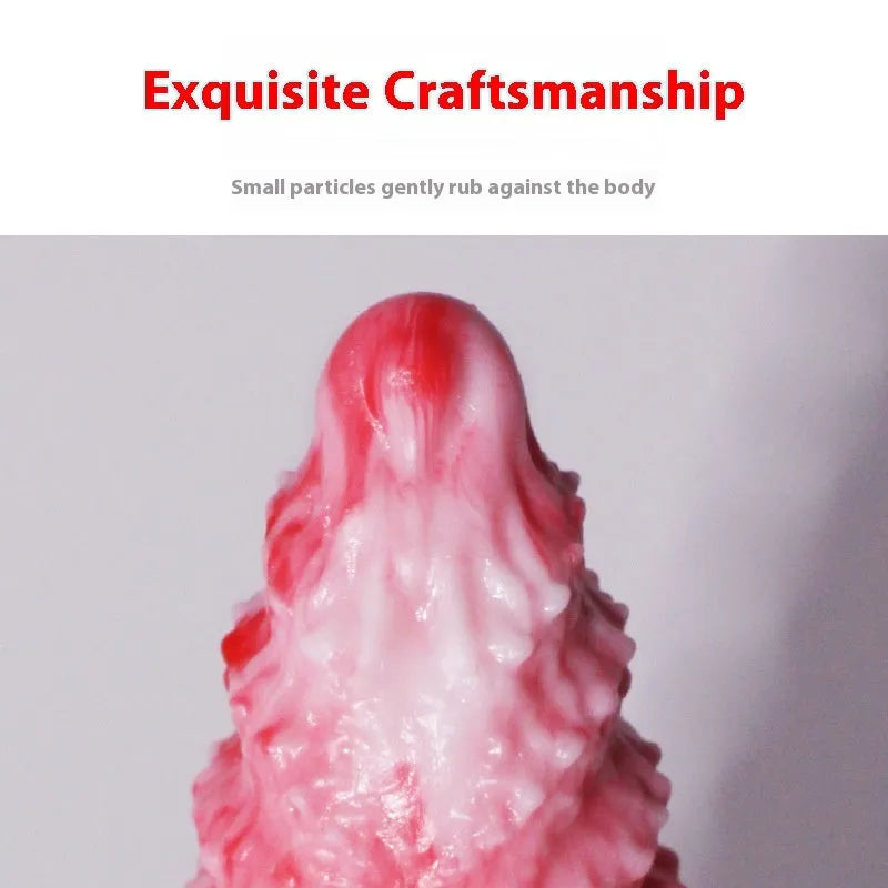 Pink platinum silicone women's masturbation device shaped like a penis