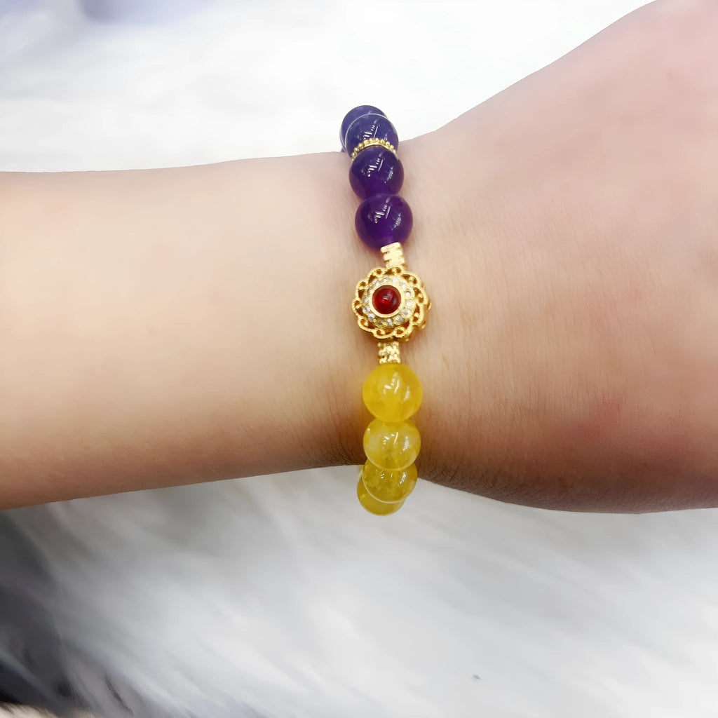 Handmade women's amethyst crystal bracelet with yellow and purple stones