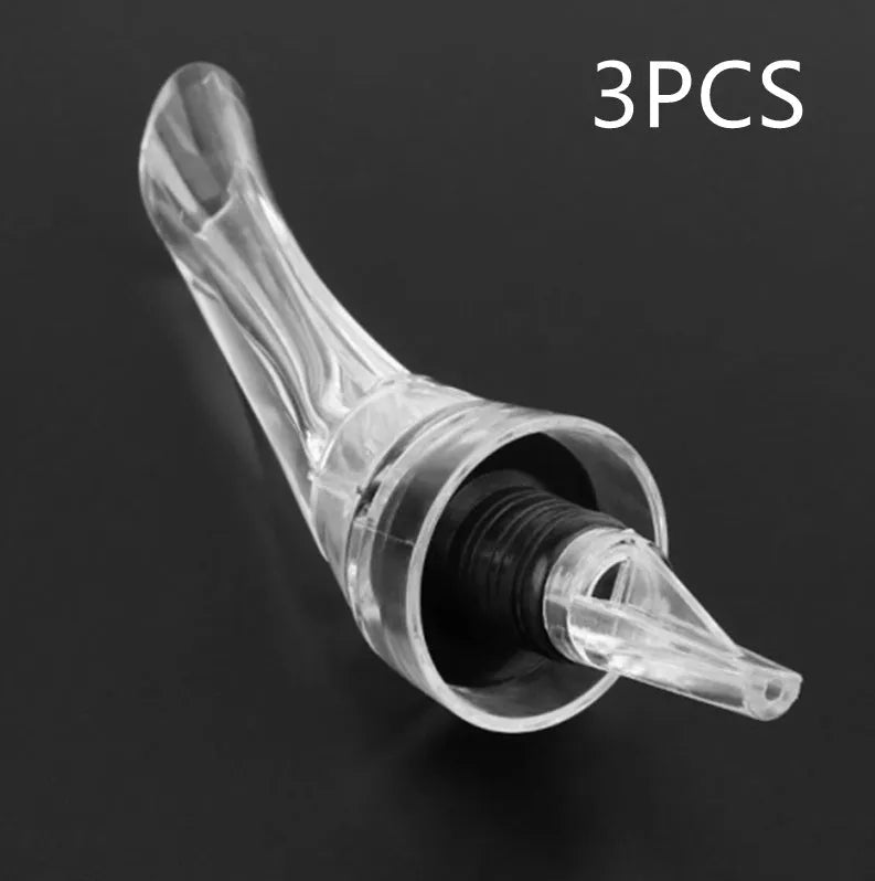 Clear acrylic wine aerator with stainless steel filter, measuring 16cm long.