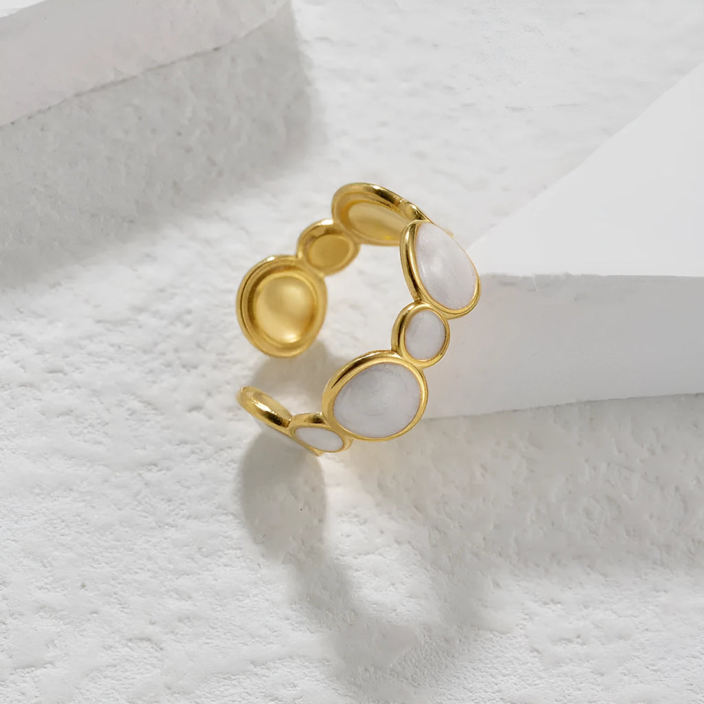 Adjustable geometric stainless steel ring with electroplated surface design