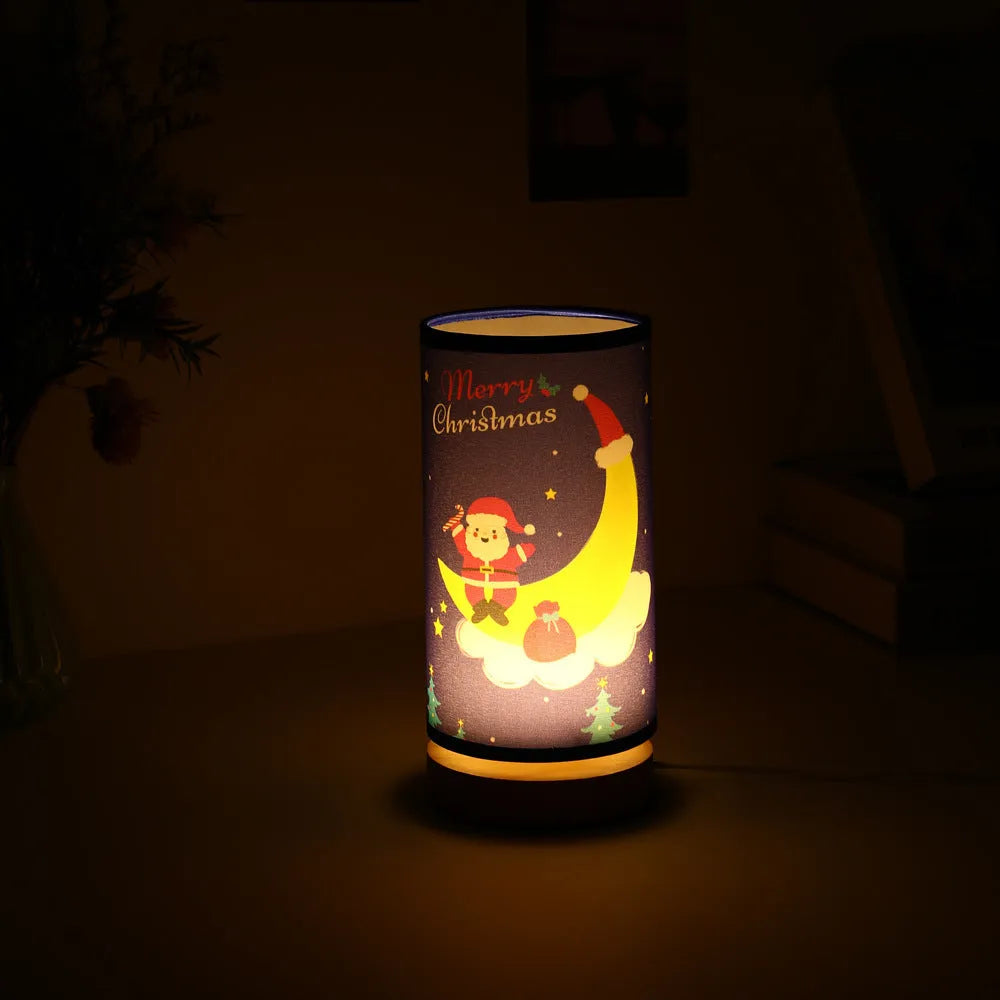 Moon Santa Claus themed LED night light with a bamboo base and a USB plug cable.