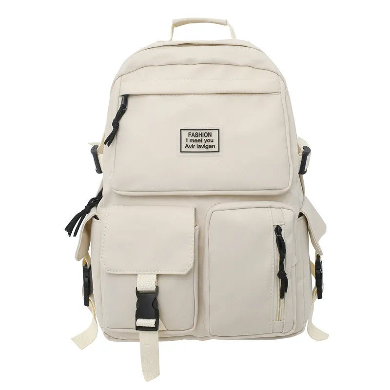 Soft nylon student backpack in black or white with computer compartment and three-dimensional pockets