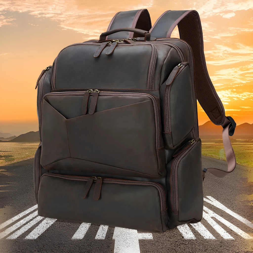 Dark brown leather backpack with 17-inch computer compartment and organisational pockets