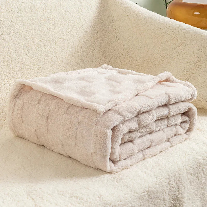 Geometric patterned polyester blanket in milky white showing cotton velvet texture and thickened construction
