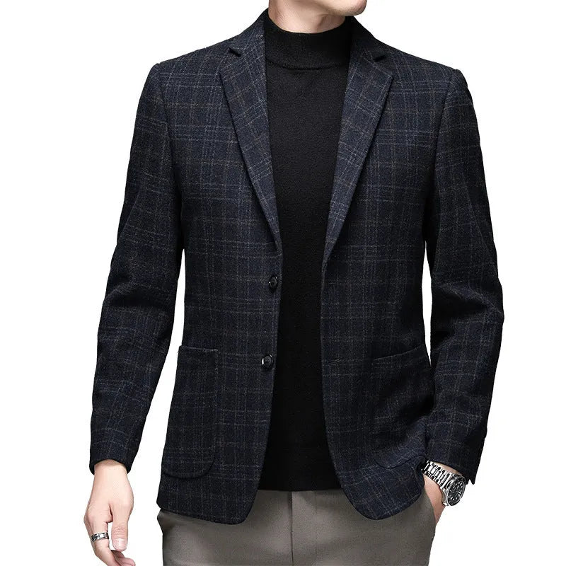 Men's loose fit wool suit jacket in solid colour showing round hem design and long sleeves
