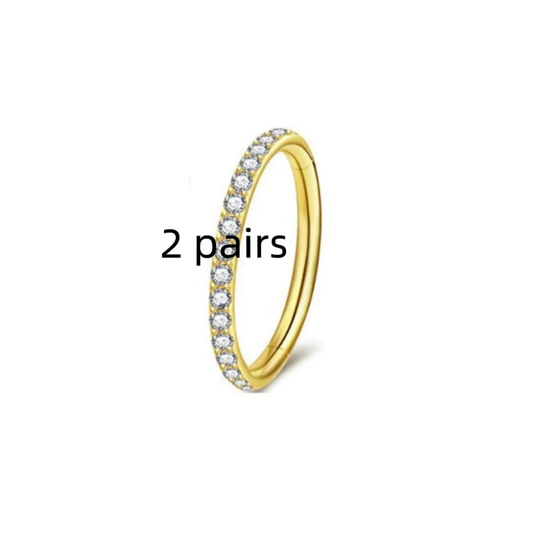 Stainless steel seamless nose ring with diamond detail showing multiple colour finishes and size options