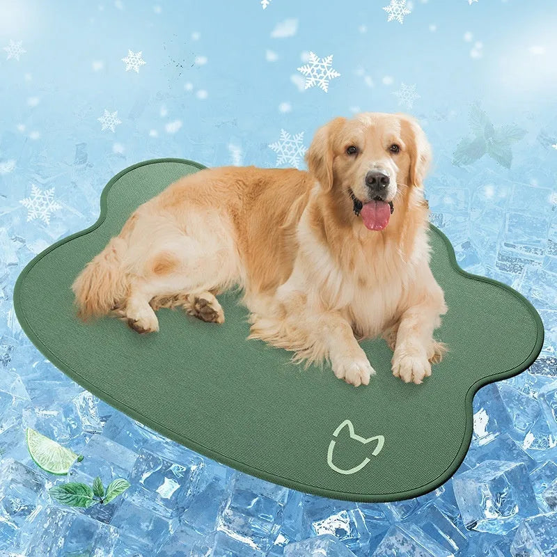 Ice silk dog cooling mat with dog head profile pattern in dark gray, non-slip base, shown on a wooden floor.