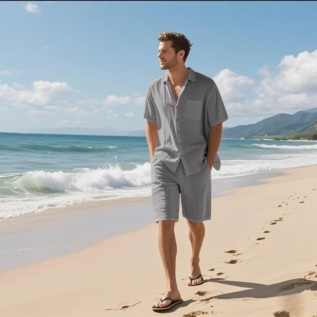 Men's light blue linen blend short sleeve shirt and matching shorts laid flat.