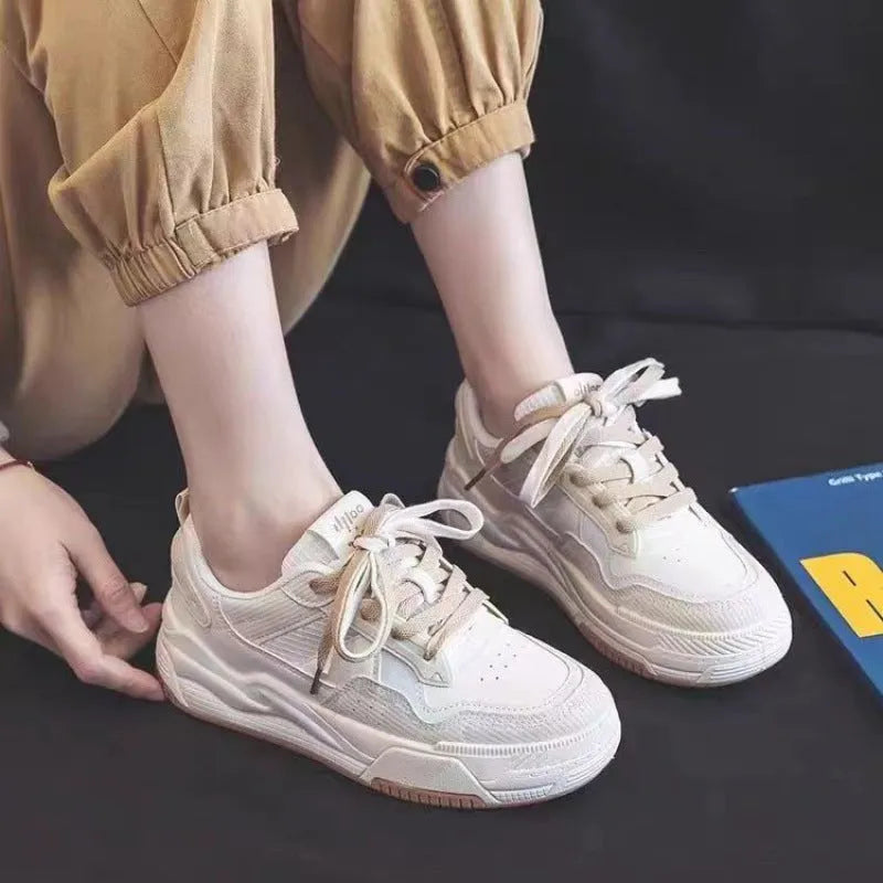 Spring rubber sneaker low top in pink and milky white colours with height increasing function