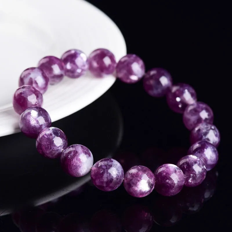Purple grandmother crystal bracelet with polished geometric beads on wrist