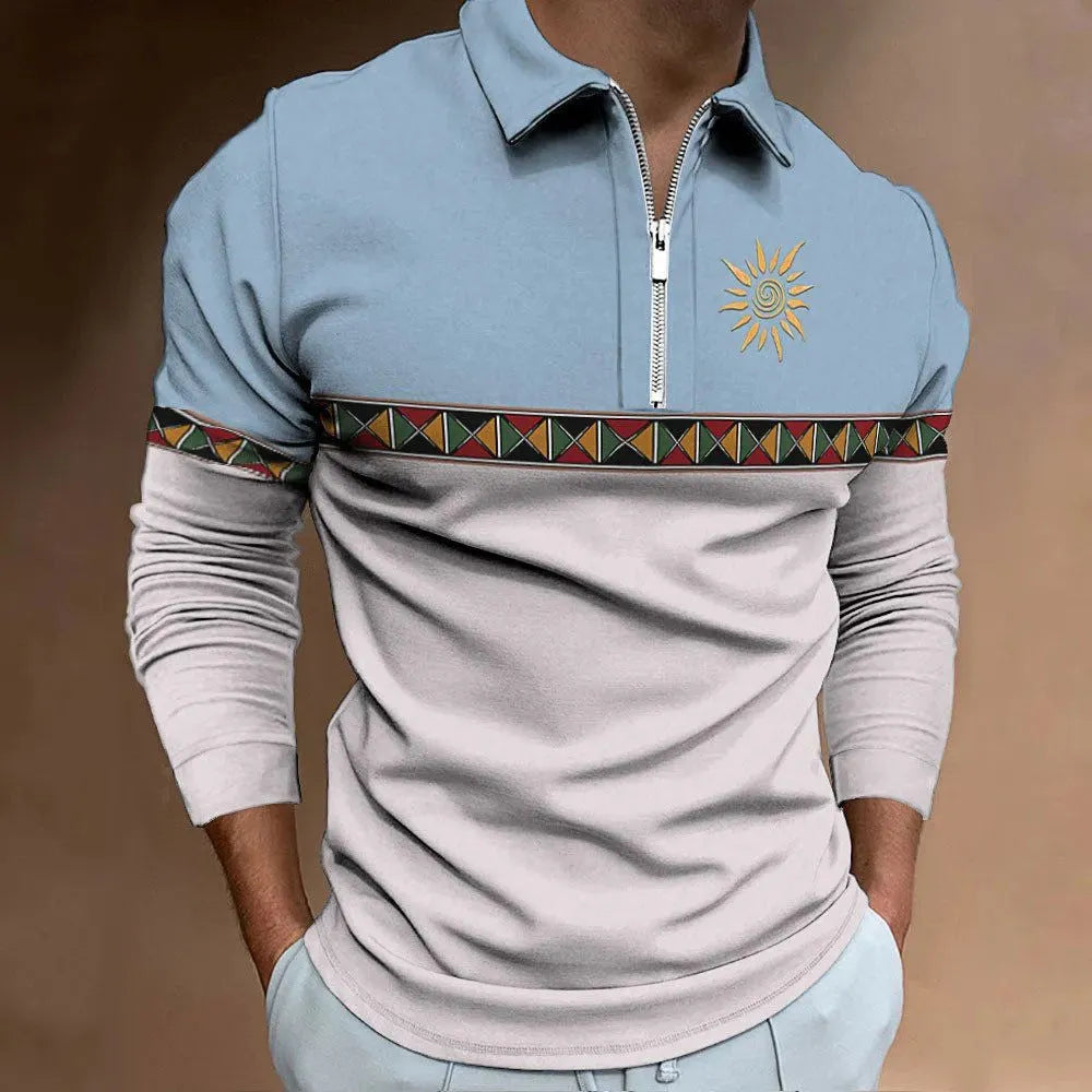 Man wearing a loose-fit long sleeve retro print t-shirt with striped and zipper decorations.