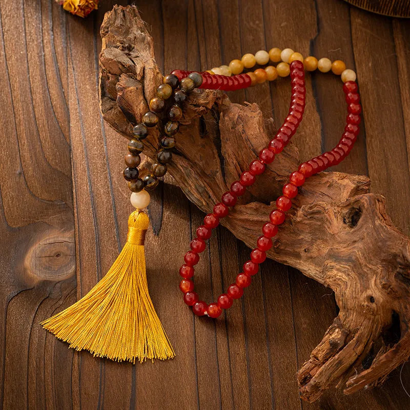 Vintage bohemian long beaded necklace and bracelet set in geometric ball chain design.
