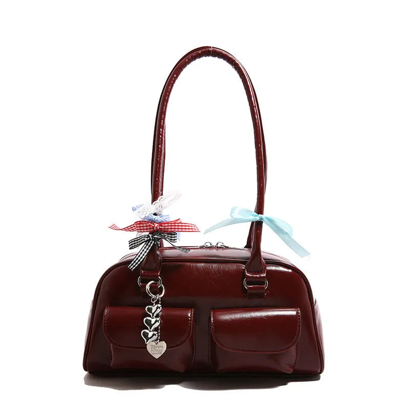 Retro pillow-shaped women's handbag in PU leather with double shoulder strap