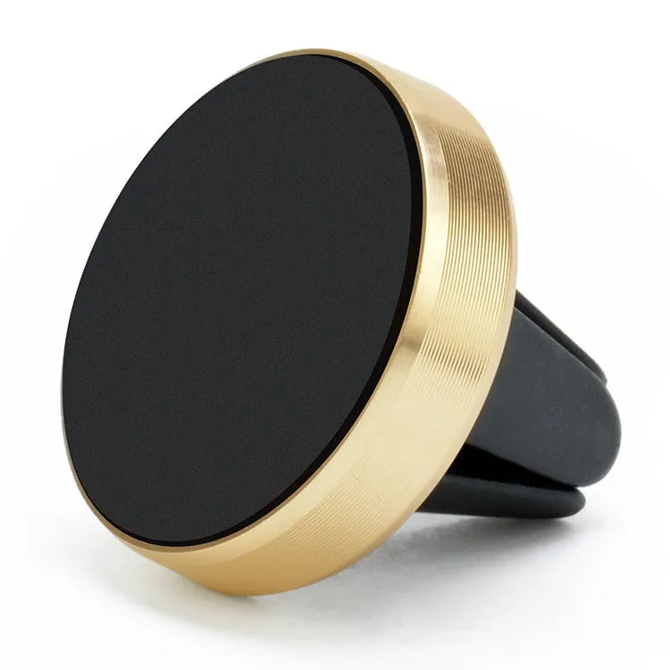 Magnetic car air vent phone holder in black mounted on vehicle vent with smartphone attached
