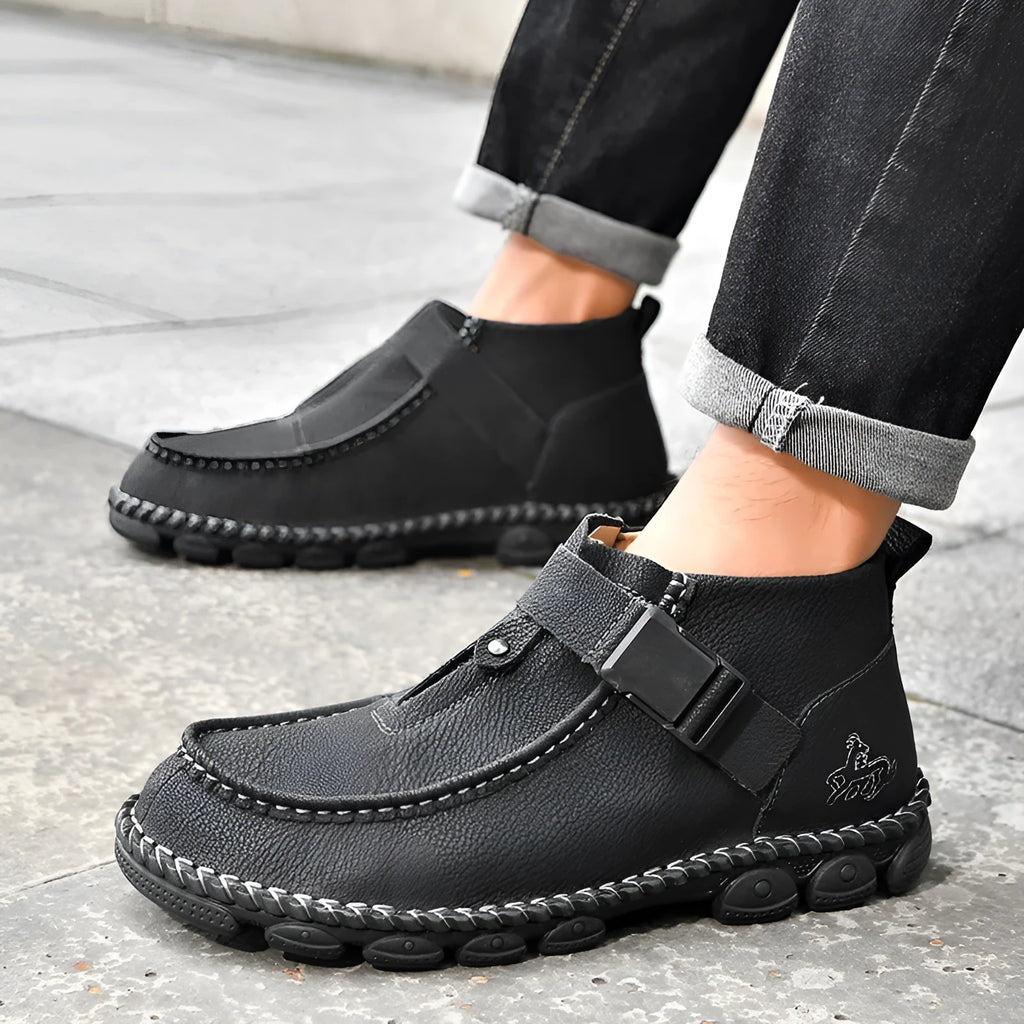 Handmade stitched casual slip-on shoes in black, flat sole with low heel.