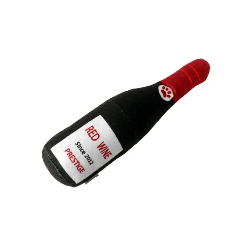 A plush fabric pet toy shaped like a wine bottle, shown in a green colour variant.