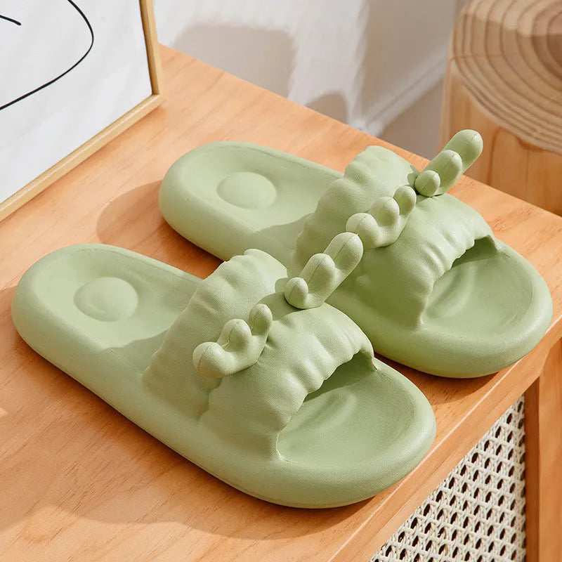 Women's deer horn design flip flop slippers in light yellow EVA material with hollow-out pattern.