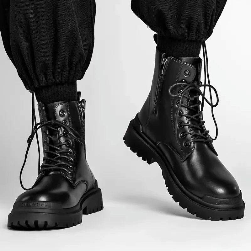 Men's black British style mid-top leather ankle boots with rubber sole.