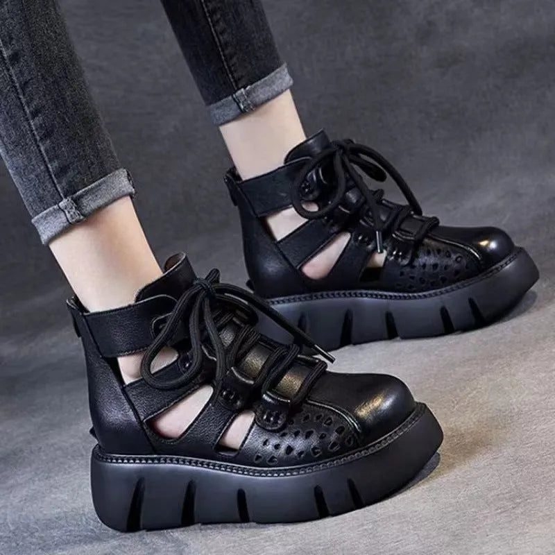 Women's black plush leather platform sandals with fish mouth toe and hollow hole design on a PU sole.
