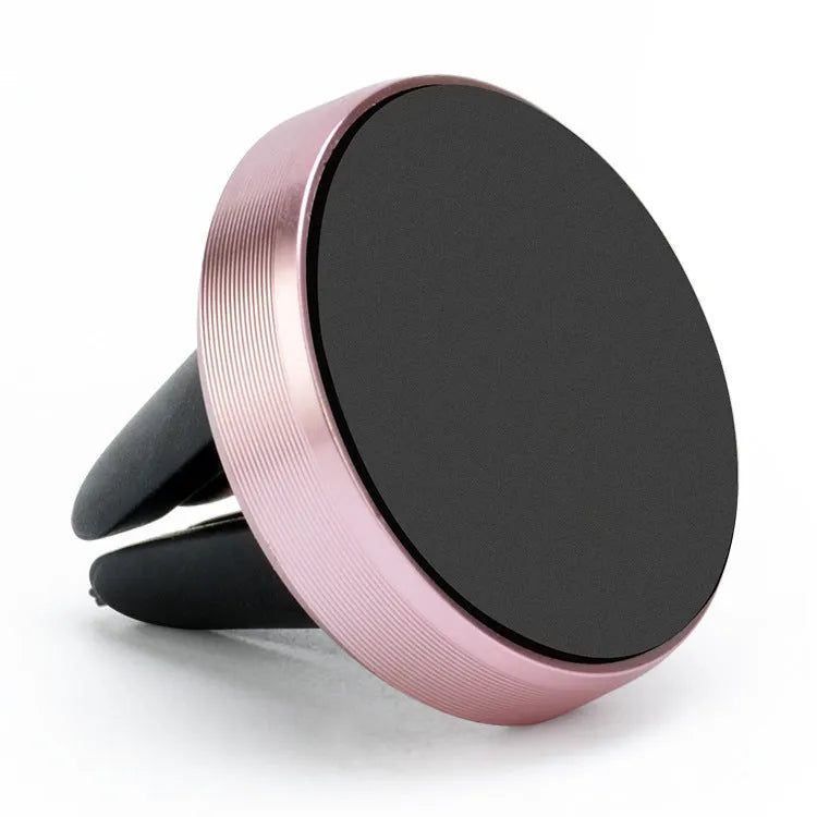 Magnetic car air vent phone holder in black mounted on vehicle vent with smartphone attached