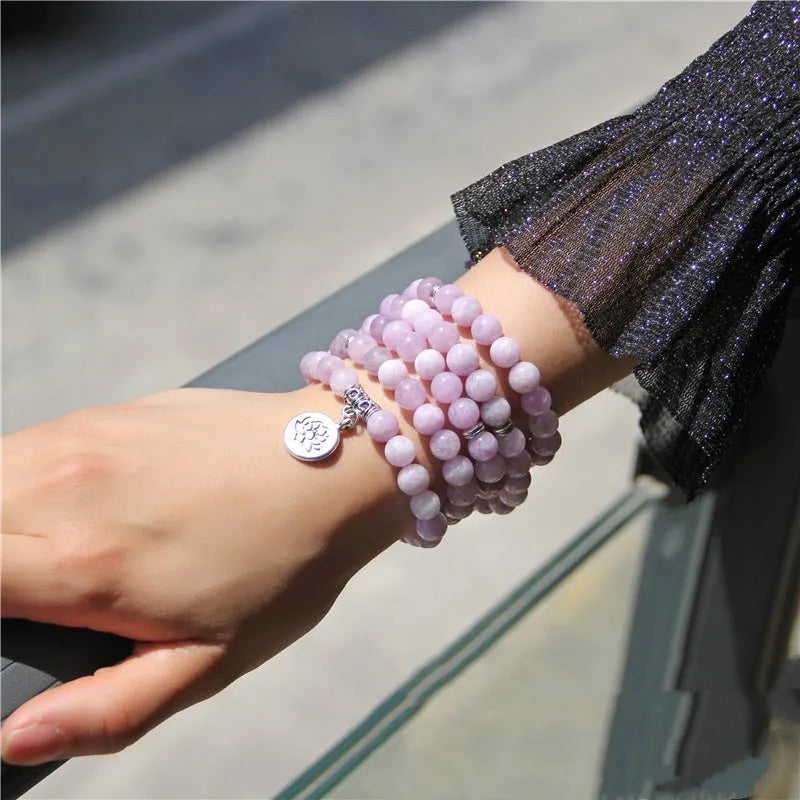 Women's vintage-style bracelet with a natural stone angel echeveria lotus pendant on a chain.