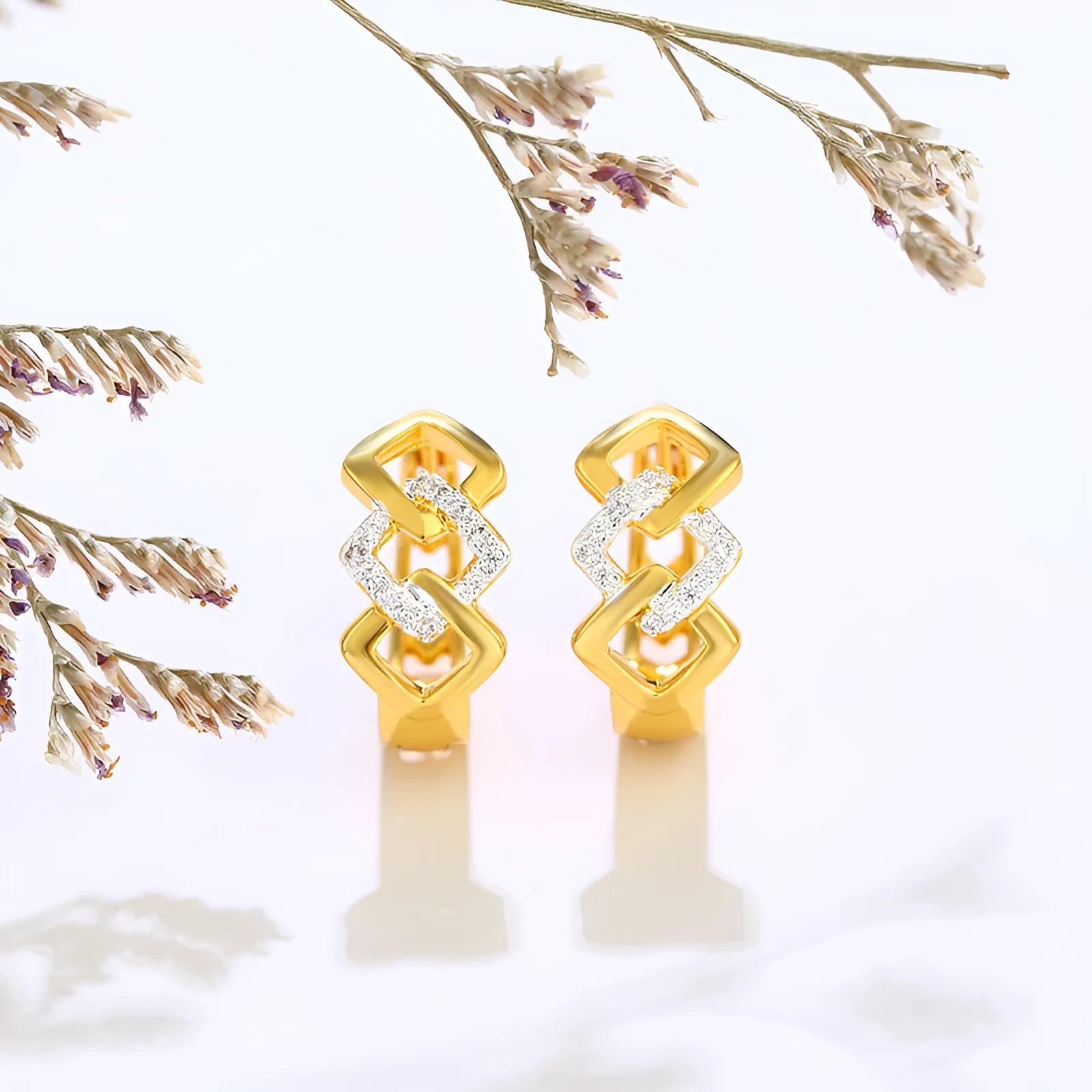 Gold geometric hollow-out clip earrings with colour separation design on alloy metal