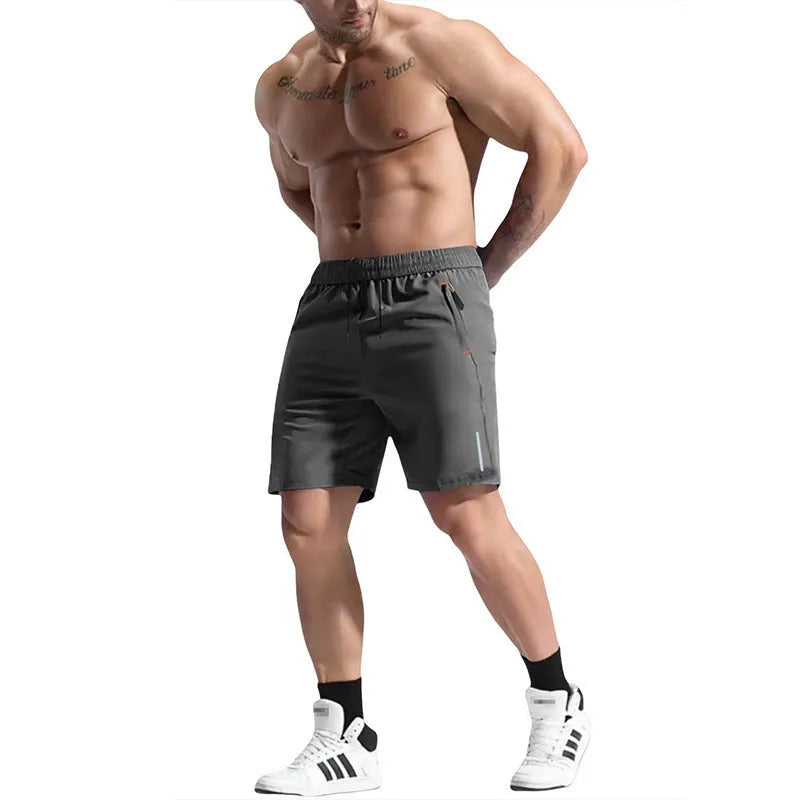 Men's grey elastic waist sports shorts made from bamboo blend fabric on a plain background.