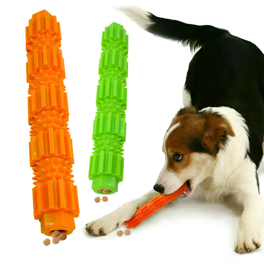 Green and orange durable rubber dog chew toy with treat-dispensing hole for aggressive chewers.