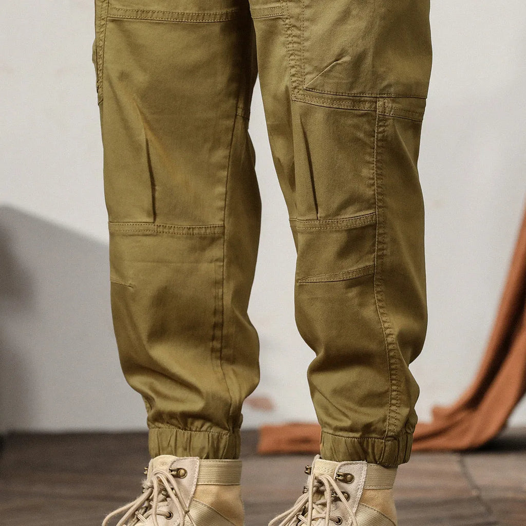 Men's loose cotton harem style trousers with tapered ankle banding in khaki colour