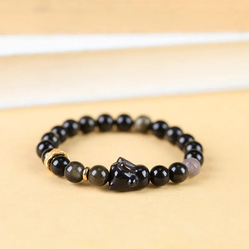Handmade obsidian bracelet with lying rabbit silver charm and grey agate beads in 8mm and 10mm sizes
