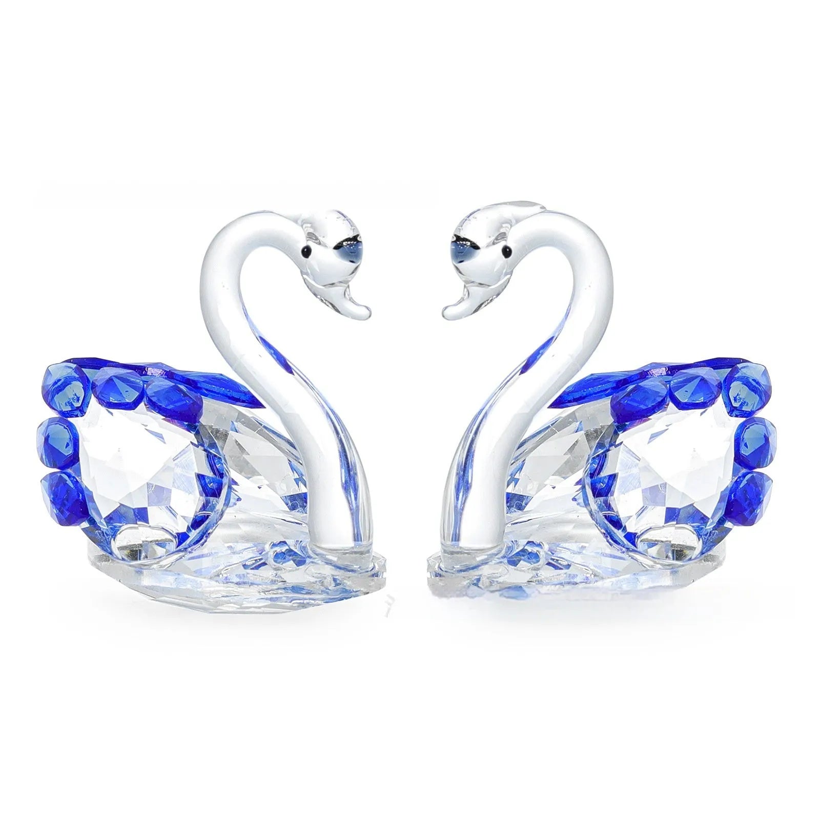 Crystal swan desktop ornament in red, blue, pink, or purple on a wooden surface.