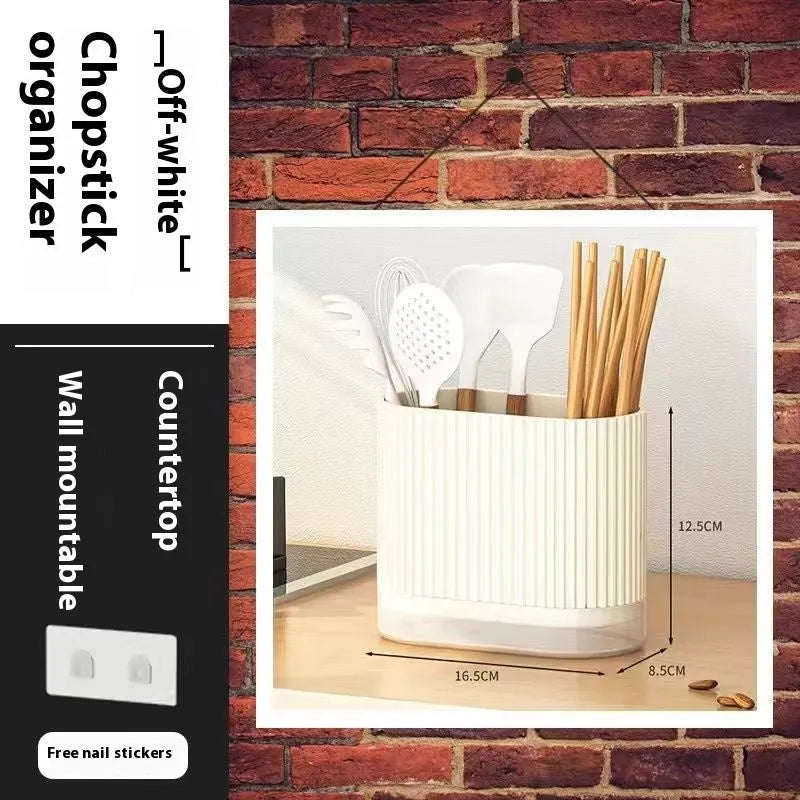 Plastic wall-mounted chopstick and spoon basket in cross-bar design on kitchen wall