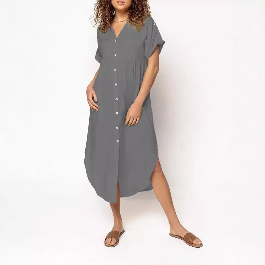 Women's loose-fit mid-length casual dress with button front in a solid colour.